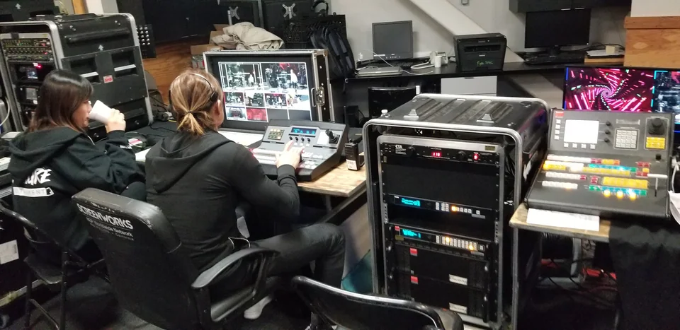 The video production position with preview monitors and switching controls.