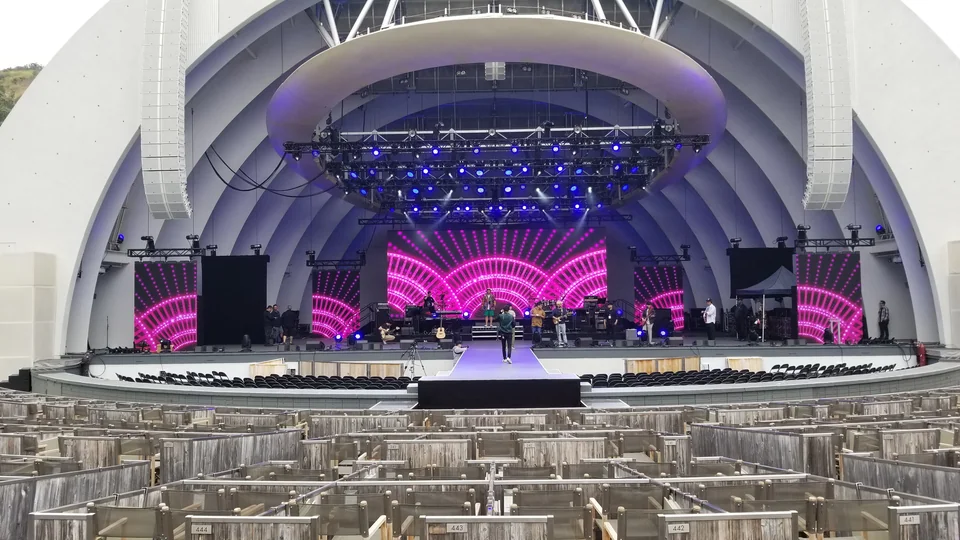 The central backdrop and vertical LED panels during preparation.